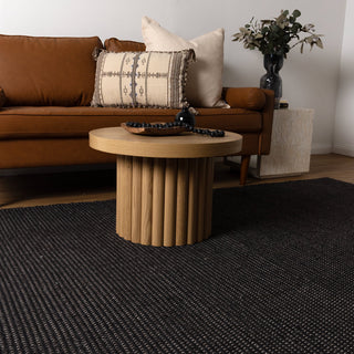 Natura Black Wool Rug in living room