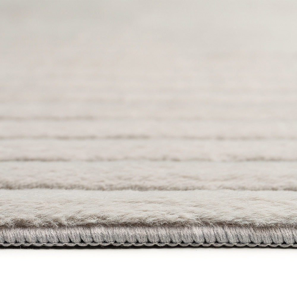 Detailed view of the Loopsie Cortina Grey Striped Faux Fur Runner Rug