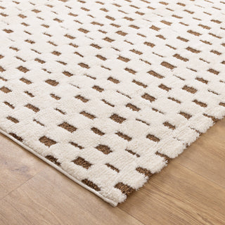 Close-up of geometric square pattern on the Mila Brown and Cream Rug