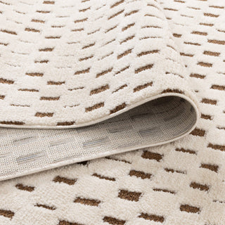 Folded Mila Monochrome Squares Brown and Cream Rug highlighting the polyester material