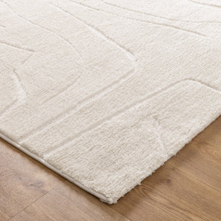 Close-up of Mila Rug’s minimalist cream linear design