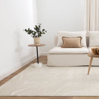 Mila Cream Rug styled in a modern living room with soft tones