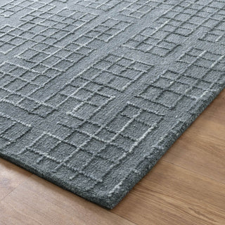 Close-up of Abasco Steel Blue Knitted Wool Rug's plush 20mm pile and high-low knotted texture.