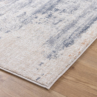 Close-up of Toscana Beige Blue Rug on laminate flooring