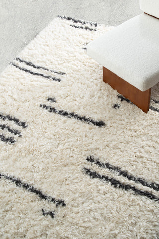 Loopsie Bao Cream and Black Striped Shag Rug Styled