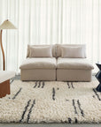 Loopsie Bao Cream and Black Striped Shag Rug In Living Room