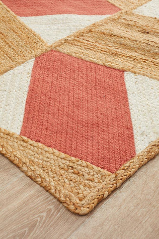 Close-up of Calypso Coral & Natural Jute Rug texture - Handcrafted jute and cotton fibres