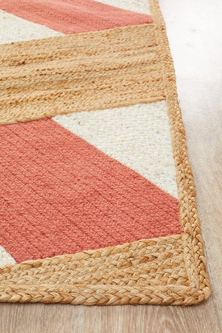 Detailed view of Calypso Coral & Natural Jute Rug pattern - Modern tribal design